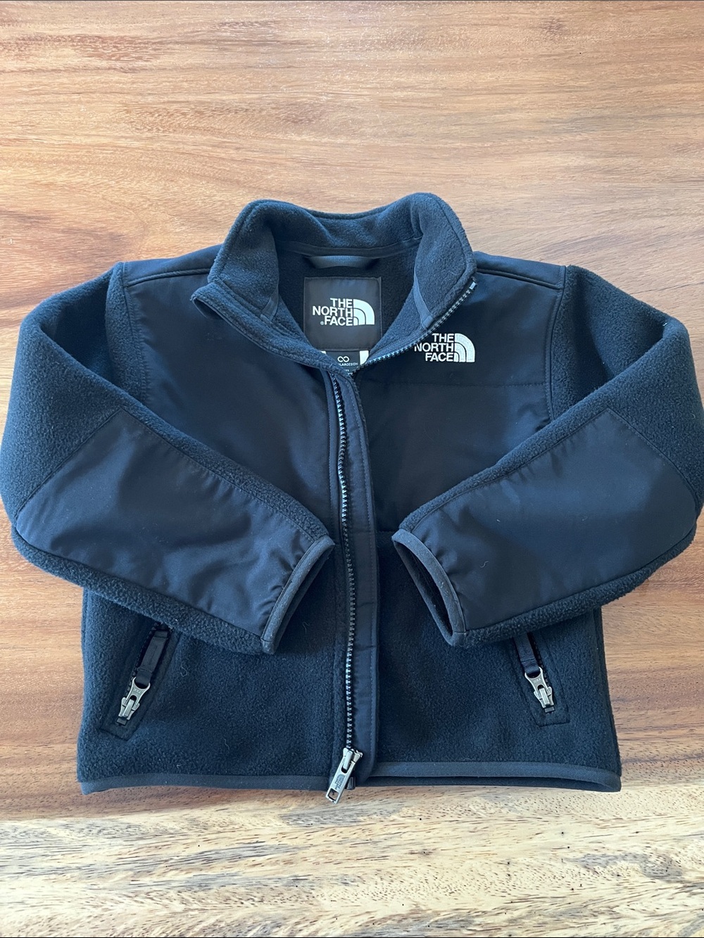 The North Face kids' black fleece zip jacket
